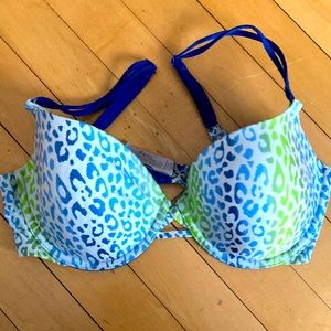 Victoria Secret 34D Demi cut - lined fun colored leopard print bra.